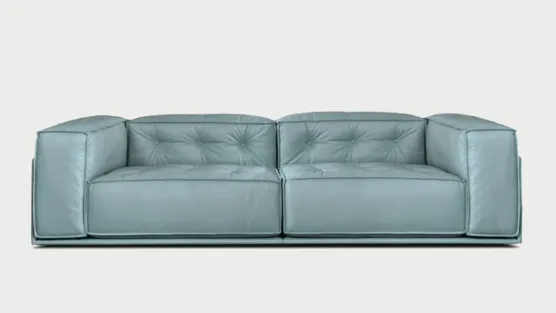 divano in pelle e bottoni Glamour 