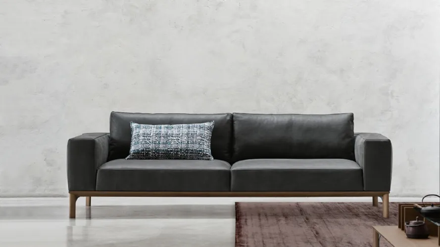 Leonard divano con basamento in legno